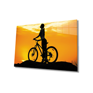 Gün Batımında Bisikletli Kadın Cam Tablo 110x70 cm