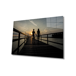 Gün Batımında İskelede Yürüyen Sevgililer Cam Tablo 90x60 cm