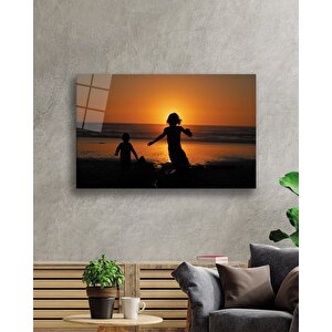 Gün Batımında Denizde Çocuklar Cam Tablo 36x23 cm