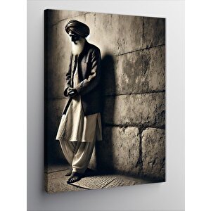 Kanvas Tablo Duvara Yaslanan Adam 100x140 cm