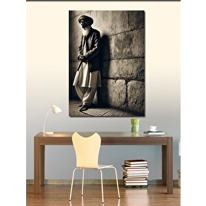 Kanvas Tablo Duvara Yaslanan Adam 70x100 cm
