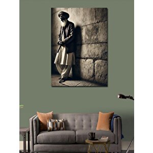 Kanvas Tablo Duvara Yaslanan Adam 70x100 cm